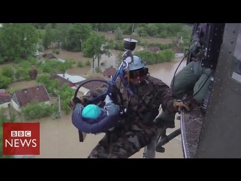 Baby rescued in Bosnia from Balkan floods- BBC News
