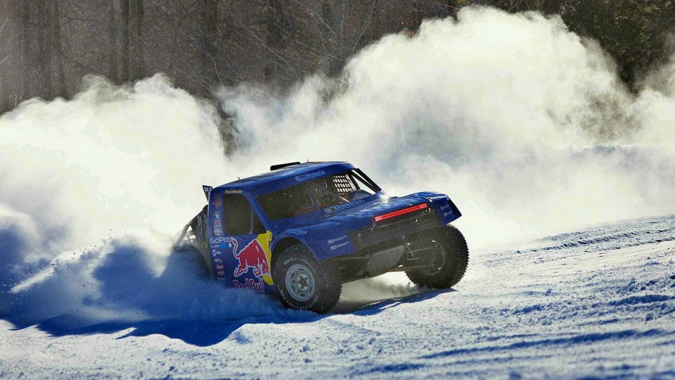 Racing Pro-4 Trucks on Snow VS Dirt